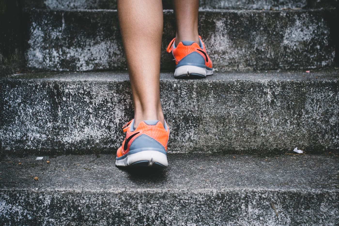 Runner on an outdoor path at dusk